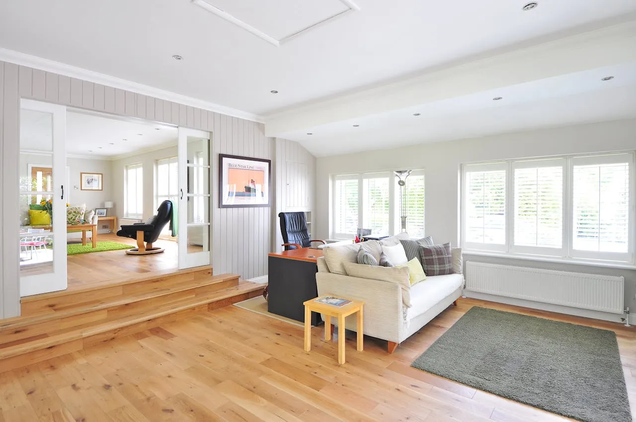 Beautiful finished room with hardwood flooring