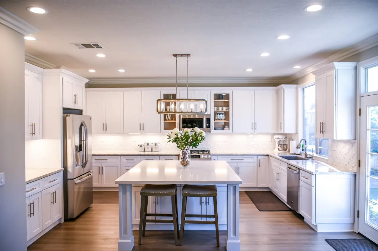 Finished kitchen renovation with modern cabinets and countertops